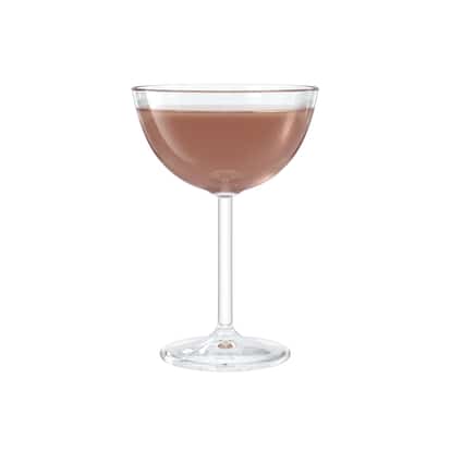 Haitian Cocktail in a stemmed coupe glass on white background