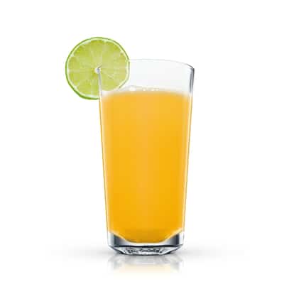 Happy Griffon Punch in a highball glass with a lime wheel on the rim on white background