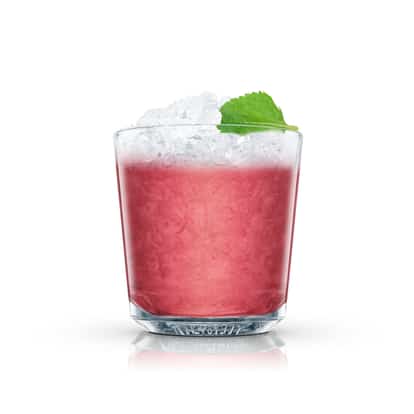 Hedgerow Sling in an Absolut rocks glass with crushed ice and a mint leaf on white background