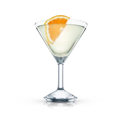 Homestead in a martini glass garnished with an orange slice on white background