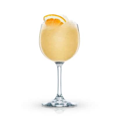I C S Cheerio in a wine glass with crushed ice and an orange slice on white background