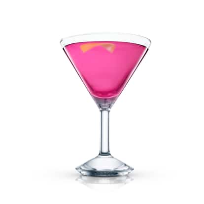 It Girl in an Absolut martini glass with lemon twist on white background
