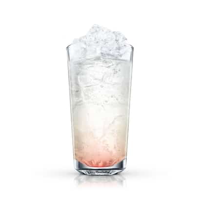 Java Cooler in a highball glass filled with crushed ice and a splash of mixer on white background