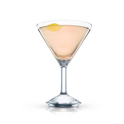 Joburg served in a martini glass with a lemon twist on white background