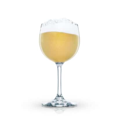 Jolly Roger in a stemmed wine glass with crushed ice and a foam layer on white background