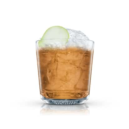 Kentucky Pear in an Absolut rocks glass with ice and a pear slice on white background