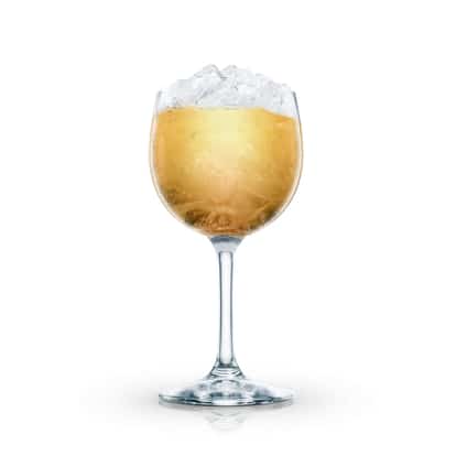 King in a stemmed wine glass with crushed ice on white background