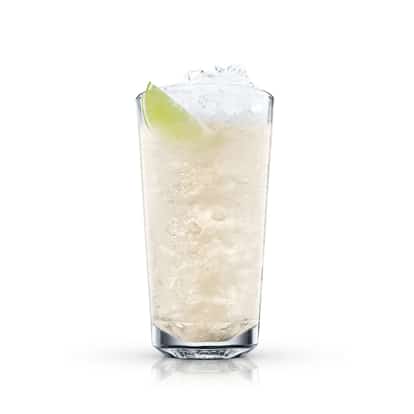 Light and Calm in a highball glass with crushed ice and a lime wedge on white background