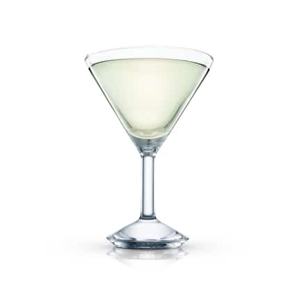 Little Princess served in a martini glass with pale green liquid on white background.