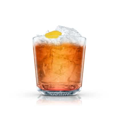 Lotus Club Special in an Absolut rocks glass with crushed ice and lemon peel on white background