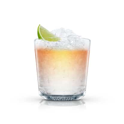 Madrid in an Absolut rocks glass with crushed ice and lime wedge on white background