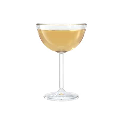 Magic Trace served in a coupe glass on white background