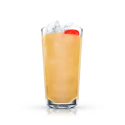 Malibu Caribbean Jewel in a highball glass with ice and a grapefruit wedge on white background