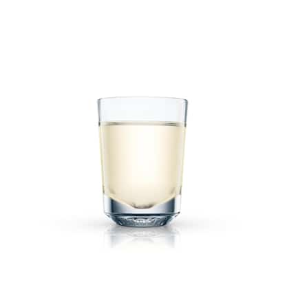 Malibu Sherbet served in a shot glass with reflection on white background