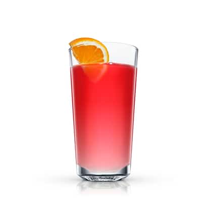 Red orange cocktail in a highball glass garnished with an orange slice on white background.