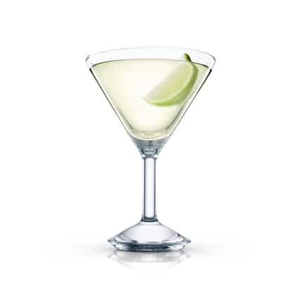 Mango Caliente served in a martini glass with a lime wedge on white background