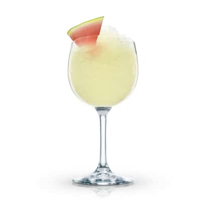 Meloncholy Baby in a wine glass with crushed ice and a watermelon wedge