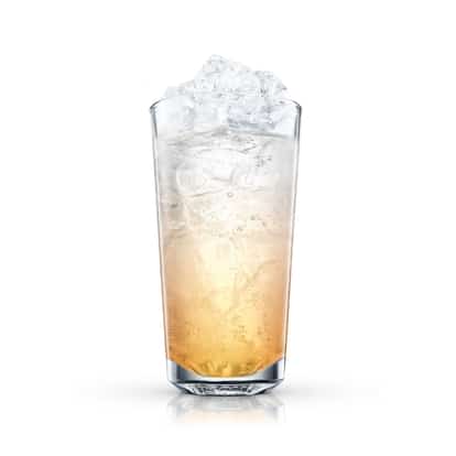 Morning Fizz in a tall highball glass topped with crushed ice on white background