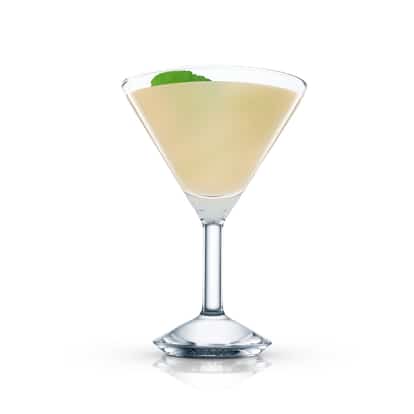 Mountain Air in an Absolut martini glass with a mint leaf on white background