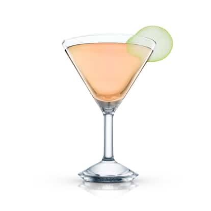 Nice Pear served in a martini glass garnished with a pear slice on white background