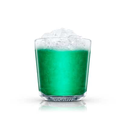 Pepparmint Frapé in an Absolut rocks glass with crushed ice on white background