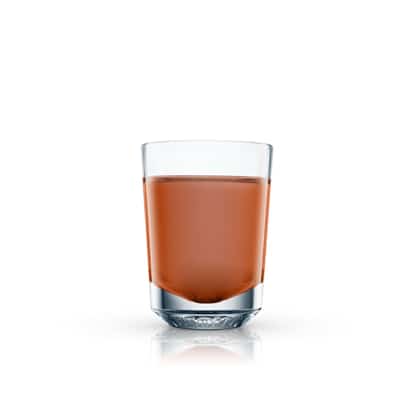 Petroleum served in a rocks glass on white background
