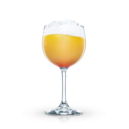 Prohibition Punch in a wine glass with crushed ice on white background