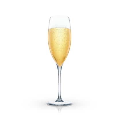 Queen’s Peg in a champagne flute on white background