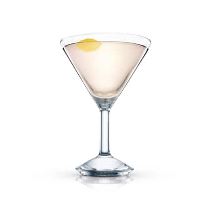 Red Coach in a martini glass with a lemon twist on white background