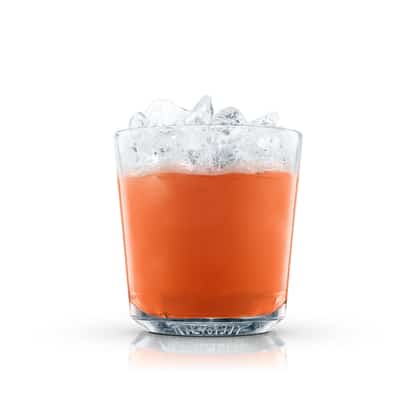 Red Devil in an Absolut rocks glass topped with crushed ice on white background