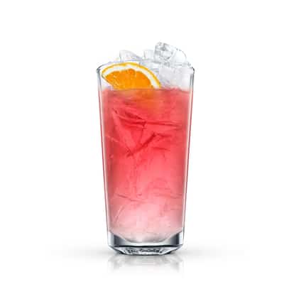 Red Dollar Holiday Punch in a highball glass with ice and an orange slice