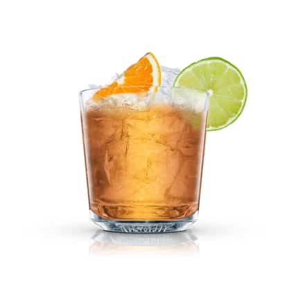 Rum Scoundrel in an Absolut rocks glass with crushed ice, an orange wedge and a lime wheel on white background