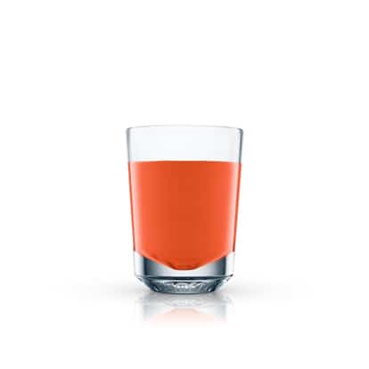 Sangrita in a rocks glass on white background