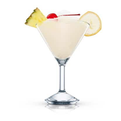 Scorpion served in a chilled martini glass with pineapple wedge, maraschino cherry and banana slice
