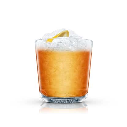 Scotch Mist in an Absolut rocks glass topped with crushed ice and a lemon twist on white background
