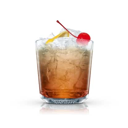 Sheepshead in an Absolut rocks glass with crushed ice, lemon twist and maraschino cherry