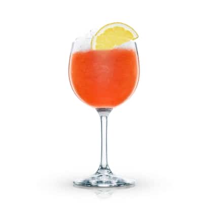 Sherry Cobbler with crushed ice and a lemon slice in a stemmed wine glass on white background