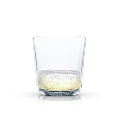 Silver Fizz in an Absolut rocks glass with a small pour on white background