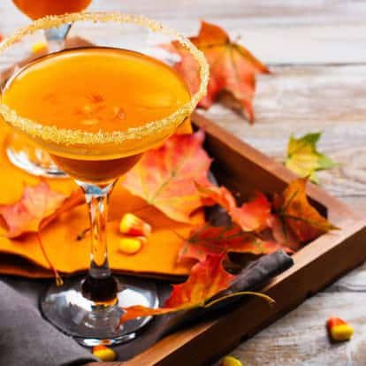Spooky Martini served in a Martini glass surrounded by