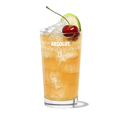 Suffering Bastard served in an Absolut highball glass with crushed ice, lime wheel and cherry