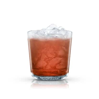 Suicide Cocktail in an Absolut rocks glass with crushed ice on white background