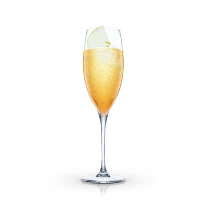 Summer Rye in a champagne flute with an apple slice garnish on white background