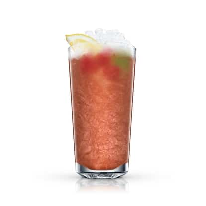 Summer Smash served in a highball glass with crushed ice, a lemon wedge and a mint sprig on white background