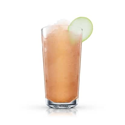 Talisman served in a highball glass with crushed ice and an apple slice garnish on white background
