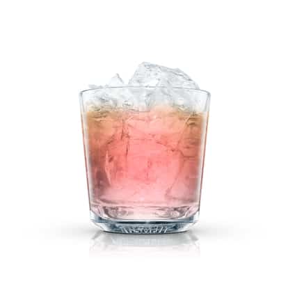The Cotton in an Absolut rocks glass with crushed ice on white background