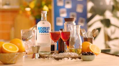 Café Royal Vodka next to a bottle of Absolut Vodka