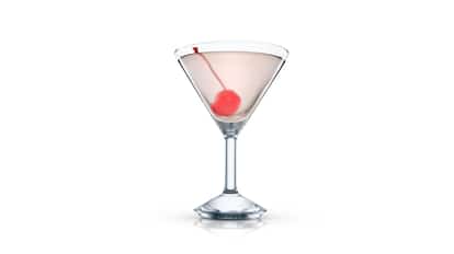 A Sunny Day in a martini glass with a maraschino cherry on white background