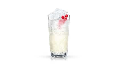 Absolut Spritz in a highball glass with crushed ice and currant garnish on white background