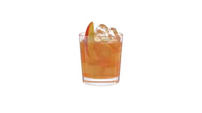 Alabama Slammer No 2 in a rocks glass with ice and a peach wedge on white background