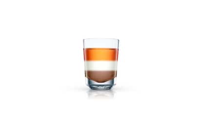 All Fall Down layered in a shot glass with three layers on white background
